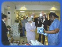 Kaye with reporter and hospital staff