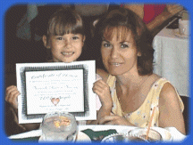Meredith gets her Wings Certificate for her donation to the Emerson Hospital project